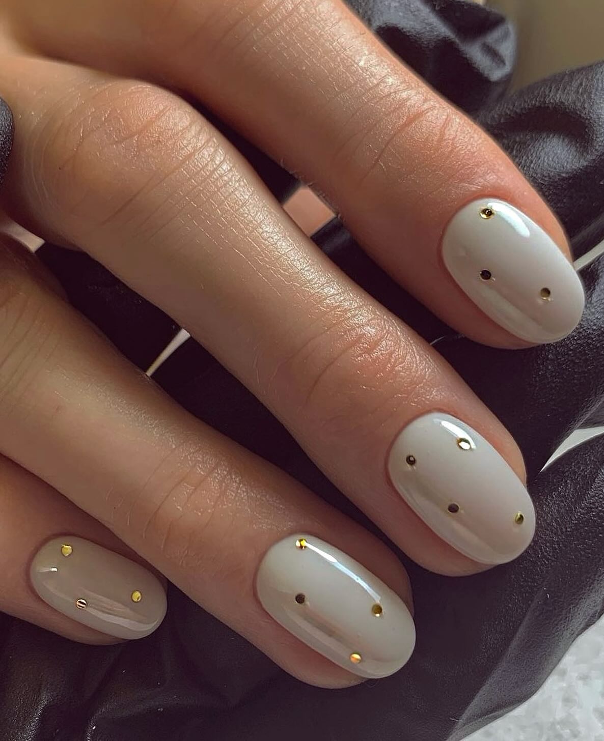 thedailynailofficial beige nails for christmas gold dots